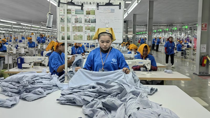 Employees work at a Chinese-funded textile and garment factory on November 18, 2024 in Kampong Chhnang Province, Cambodia.