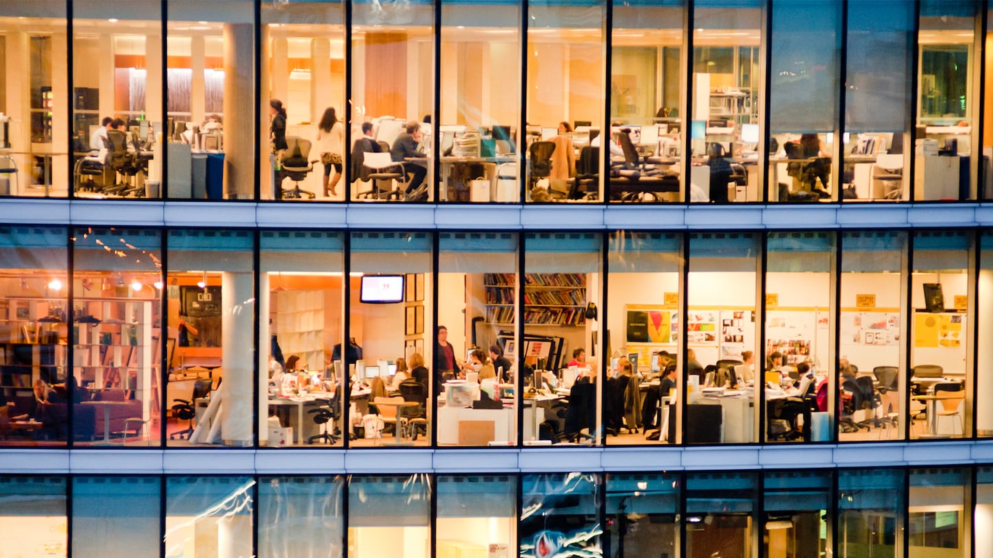 Employees, workers in an office building.